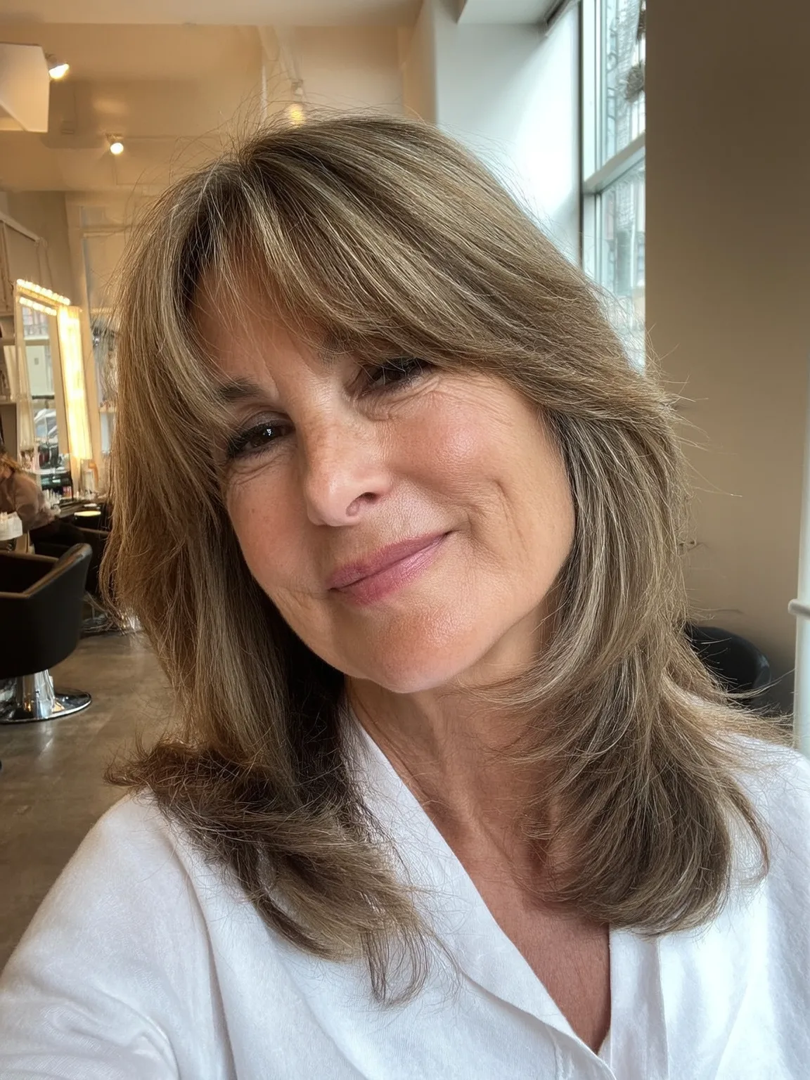 Soft Golden Brown Wavy Feathered Shoulder-Length Layers